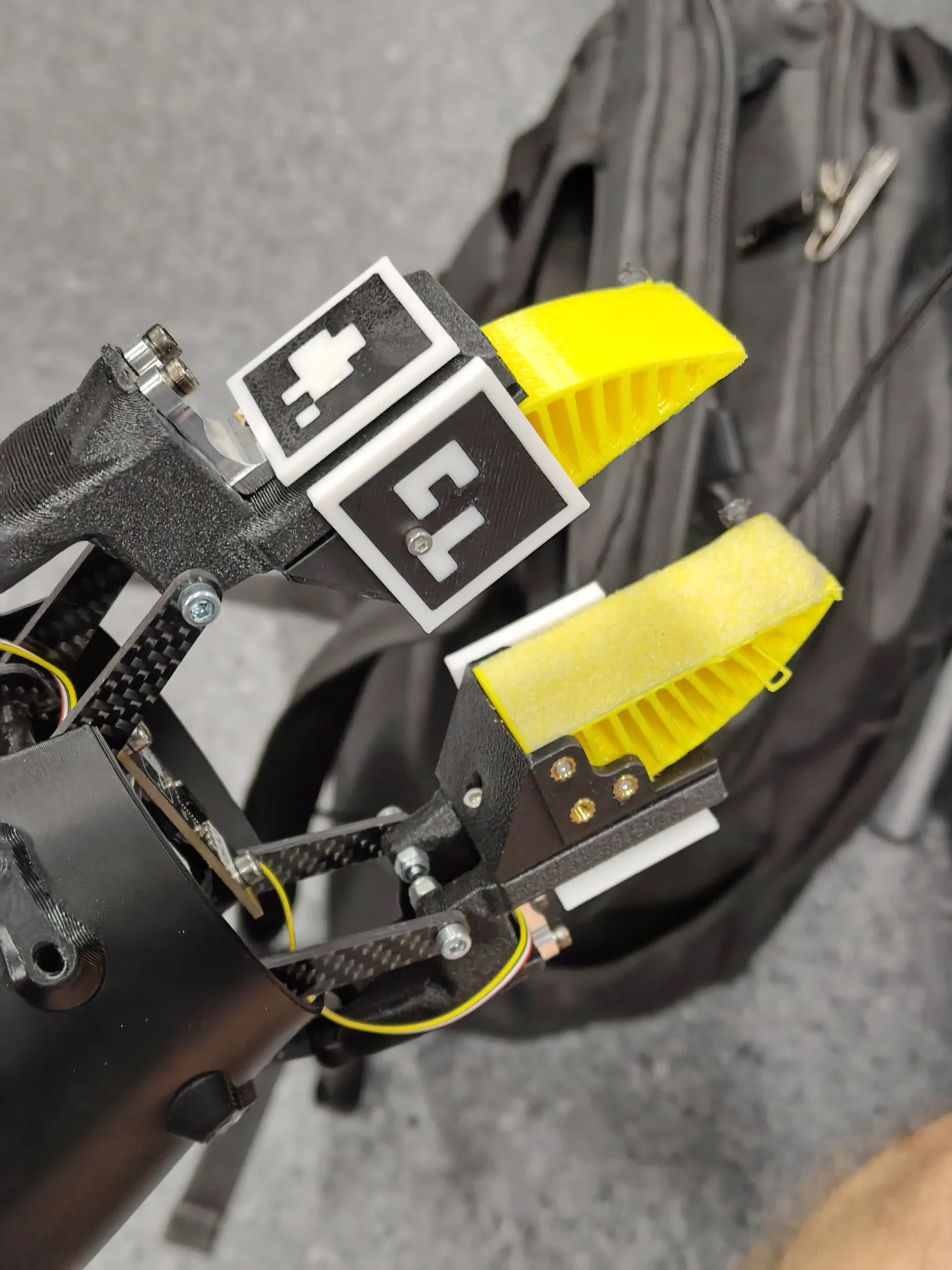 The gripper with its ArUco markers